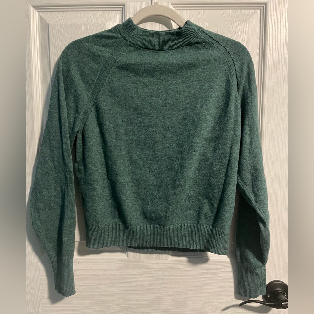 Moderate green sweater